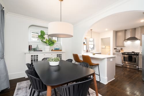 Gather around this stylish dining table for memorable meals, with the open kitchen perfect for cooking together during your stay.