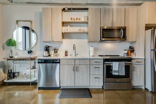 Your modern kitchen features stainless steel appliances, sleek cabinetry, and everything you need to create memorable meals during your stay.